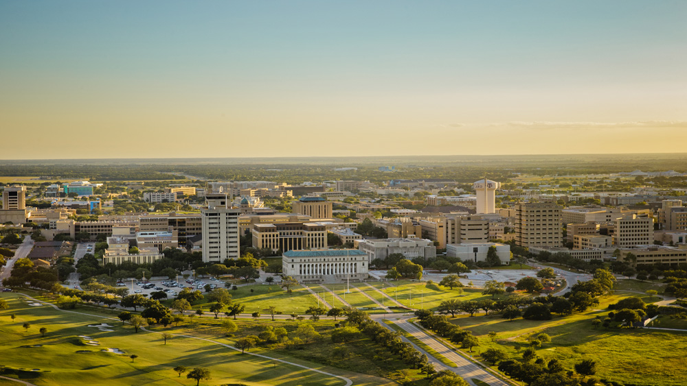 Aerial view of the Texas A&M University campus at sunset